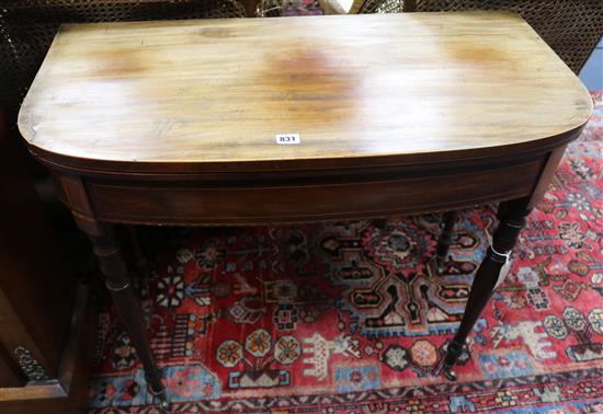 A Regency inlaid mahogany D-shaped card table W.89cm